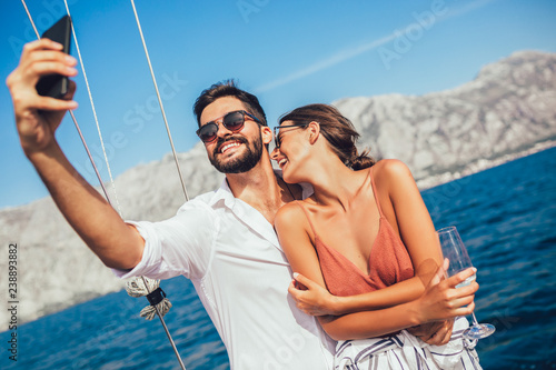 Couple in love on a sail boat in the summer. © Mediteraneo