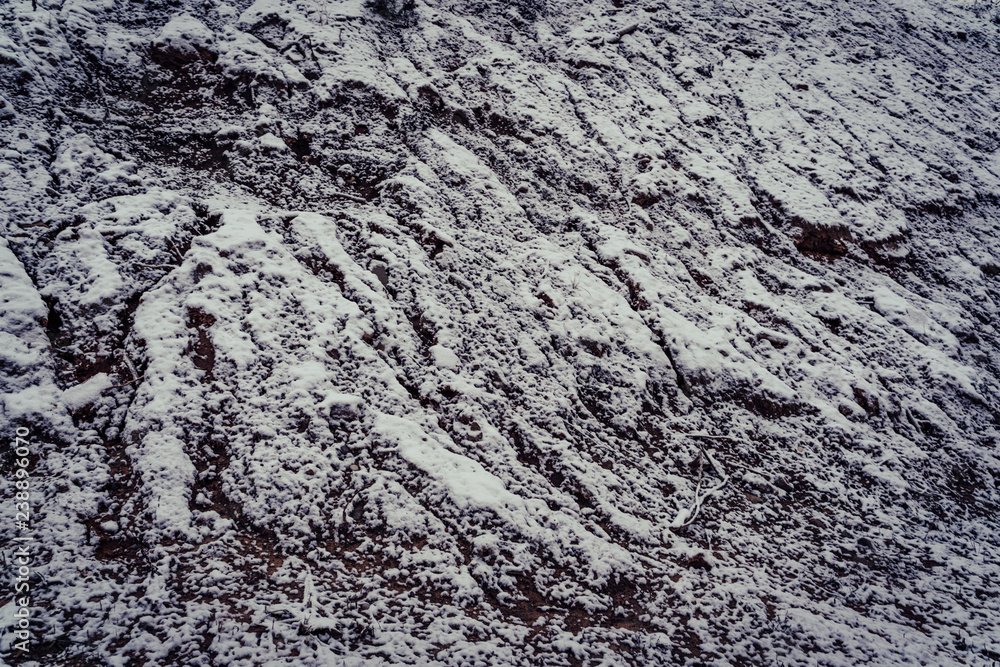 Closeup View of Sands with the Little Winter Frost and Snow on Them - Blurred pattern for Background Closeup View of Sands with the Little Winter Frost and Snow on Them - Blurred pattern for Background