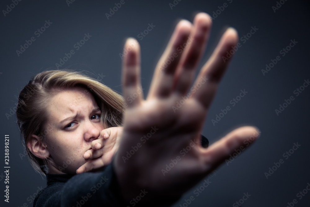 Young woman being a domestic violence victim Young woman being a domestic violence victim