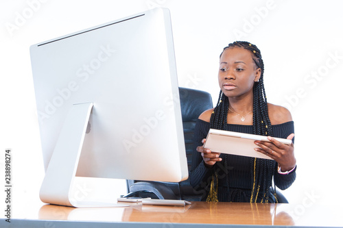 The girl is typing on the c...