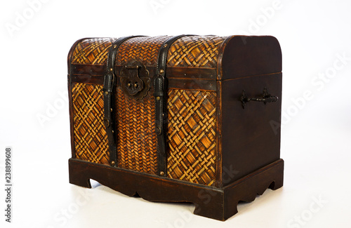 Old wooden chest isolated on white background.