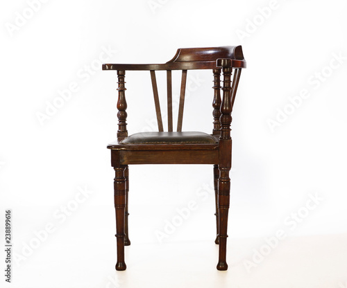 Wooden, old-fashioned corner chair. Isolated.