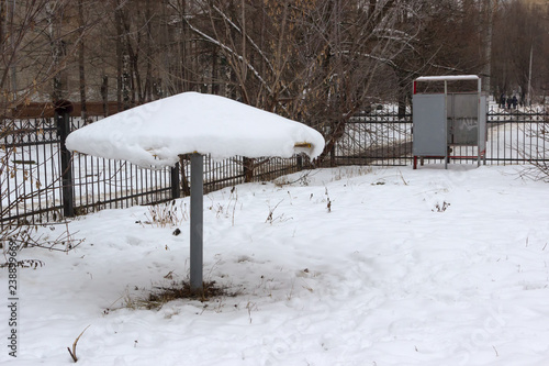 Wallpaper Mural beach umbrella in the snow, the swimming season is closed, the beach is closed. in Russia, not a season.. Torontodigital.ca