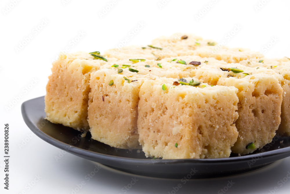 Indian Traditional Famous Sweet Food Mysore Pak or Mysoor Pak Isolated on White Background