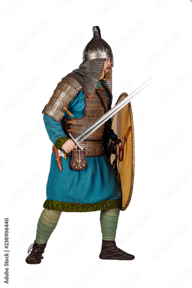 medieval soldier with helmet, hauberks, sword and shields isolated on white background. historical concept. medieval soldier with helmet, hauberks, sword and shields isolated on white background. historical concept.