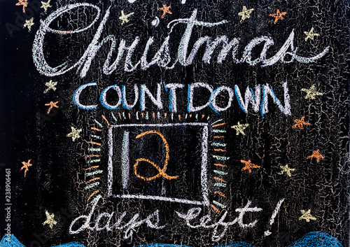 the words Christmas countdown are shown on a chalk board