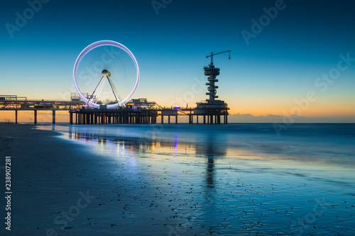 ferris wheel on the Pier at Scheveningen at sunset