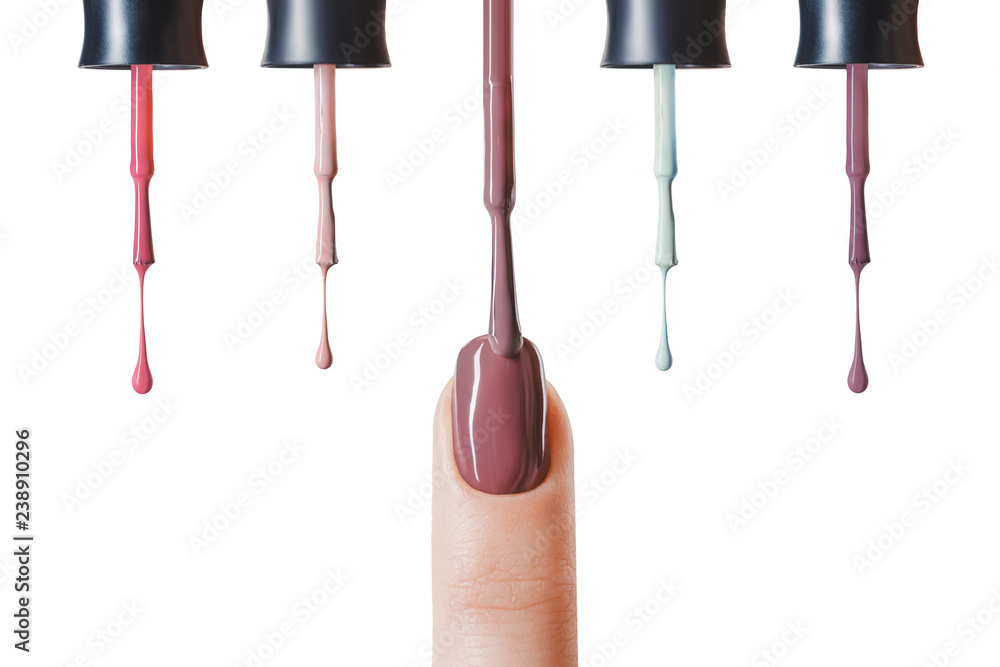 Φωτογραφία brown nail polish on fingernail of woman with wet brush isolated on white
