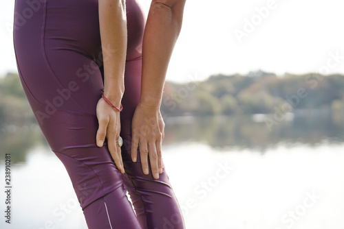 Close up of yogis hands outdoors by lake