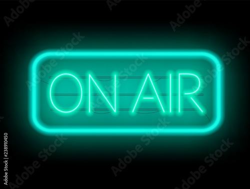 On air glowing sign on a dark background.