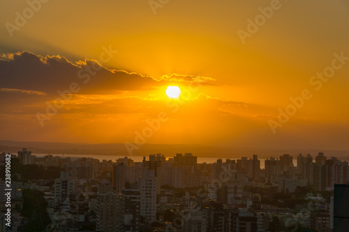 Sunset hour in Porto Alegre, Rio Grande do Sul, Brazil with the city buildings as landscape