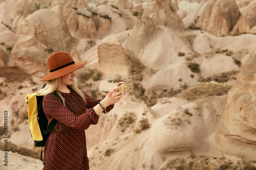 Woman Traveling Making Photo Of Nature On Phone