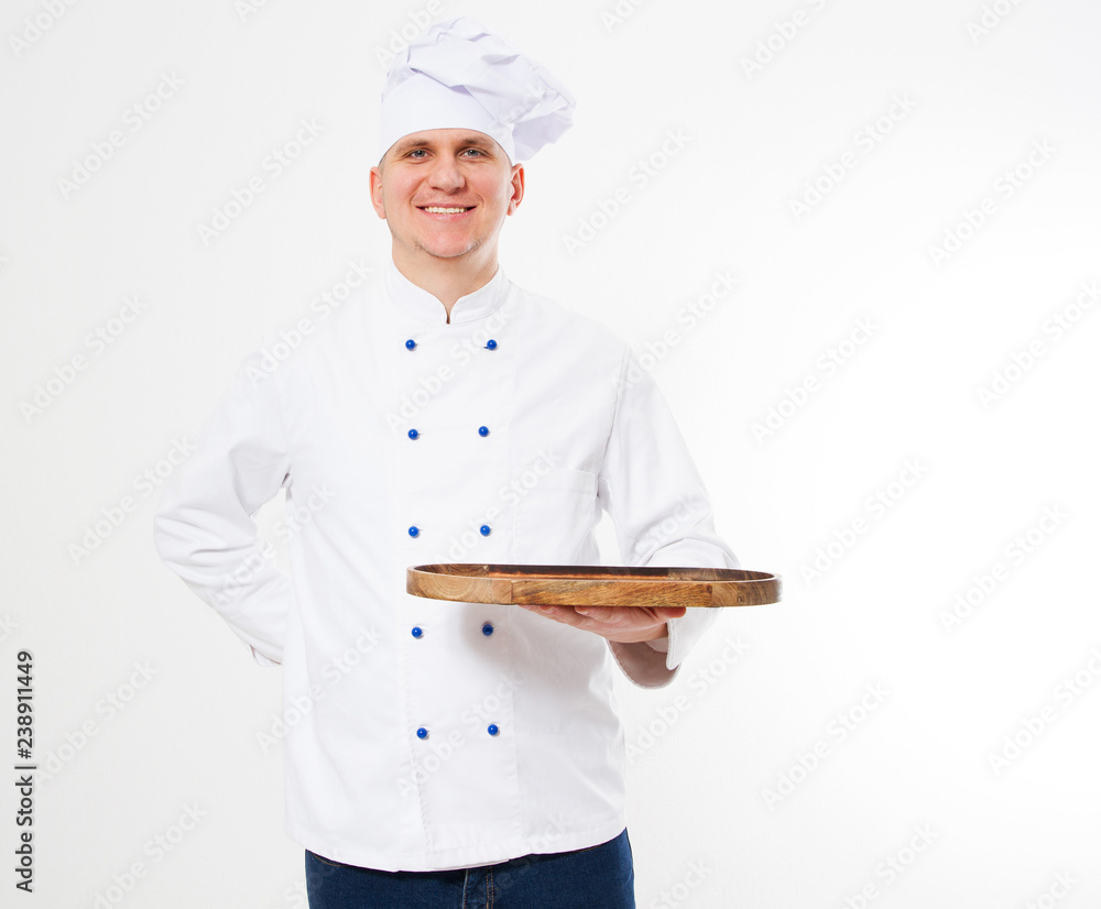 smile chef in uniform hold empty cutting desk isolated on white background smile chef in uniform hold empty cutting desk isolated on white background