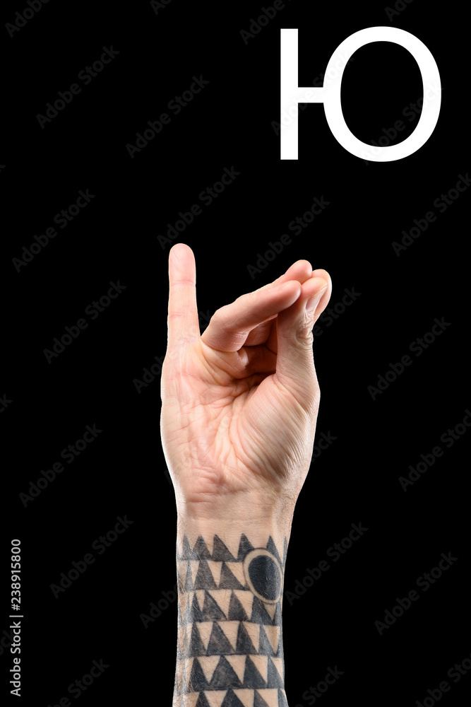 Tattooed Male Hand Showing Latin Letter - E, Sign Language, Isolated On  Black Stock Photo, Picture and Royalty Free Image. Image 116387600.