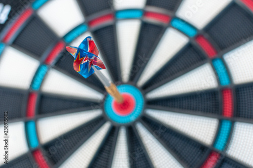 dart arrows in center of board - shallow depth of field