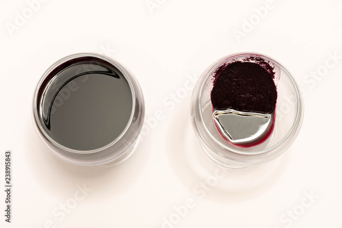 Wine sediment. Red homemade wine. Sediment wine in a glass. A wine steward