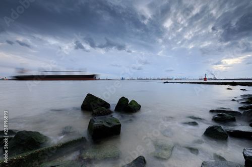 moody seascape along the Nieuwe Waterweg river photo