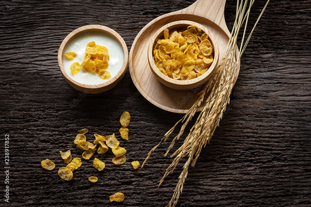 Yogurt with muesli for breakfast in the morning, loss weight and diet slimming for women, old wood background. Diet and Healthy Concept Yogurt with muesli for breakfast in the morning, loss weight and diet slimming for women, old wood background. Diet and Healthy Concept