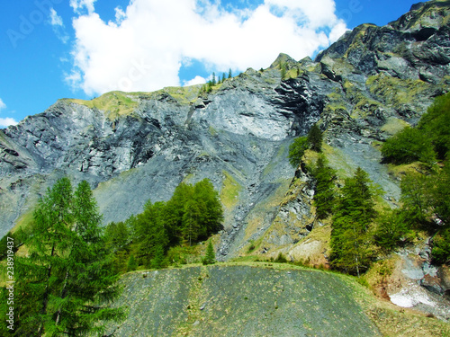 Mountains and rocks in the valley Weisstannenthal - Canton of St. Gallen, Switzerland photo