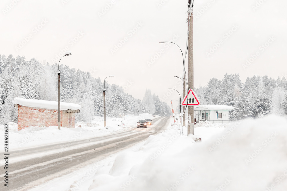 Perm, Russia - beautiful winter landscape with road and snow-covered trees