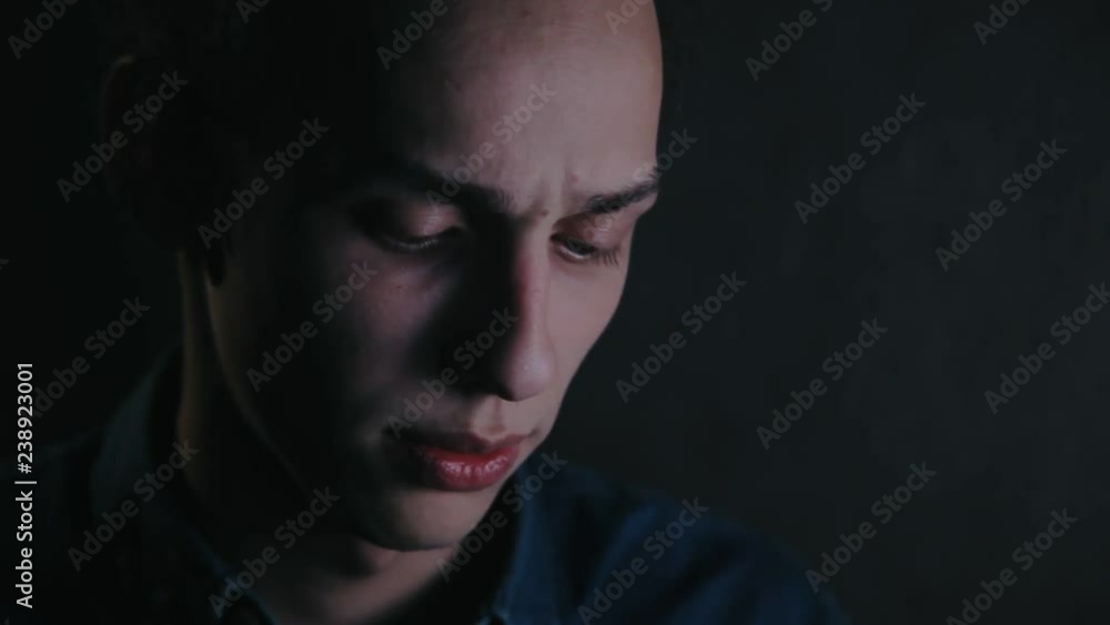 portrait of cute man wearing gaming headphones at night, close up portrait of cute man wearing gaming headphones at night, close up