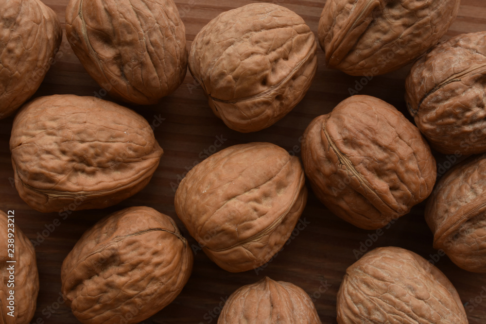 a backgound of walnuts in there shells a backgound of walnuts in there shells