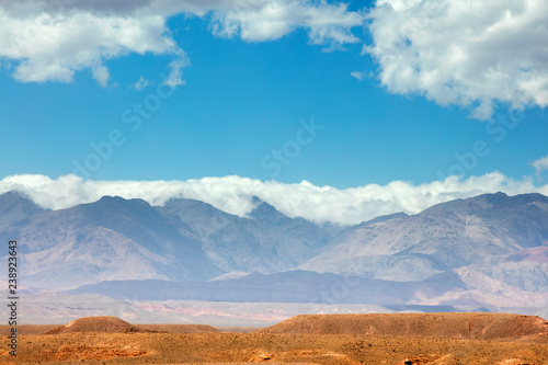 clouds above mountains  in desert in Morocco