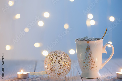 white cup with golden decor...