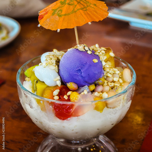 Philippine 'Halo Halo' - Dessert consisting of shaved ice and milk along with various ingredients, including boiled sweet beans, coconut, sago, gulaman (agar jelly), tubers and fruits.