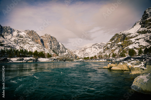 Frozen river in the mountains of Altai