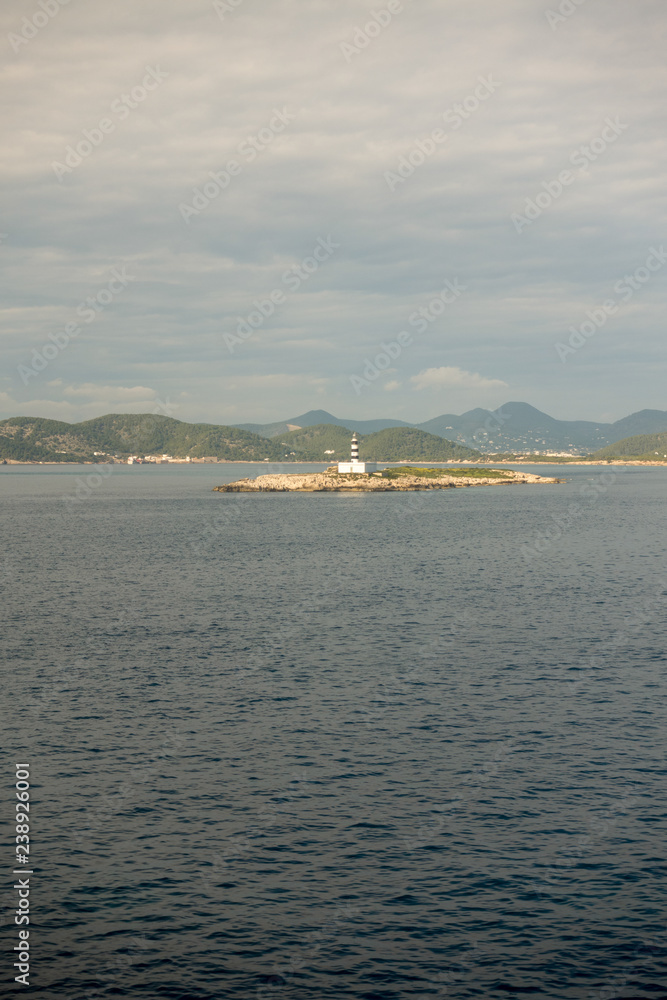 Lighthouse from the sea on the island of Ibiza