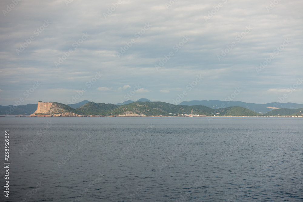 The island of ibiza seen from the sea