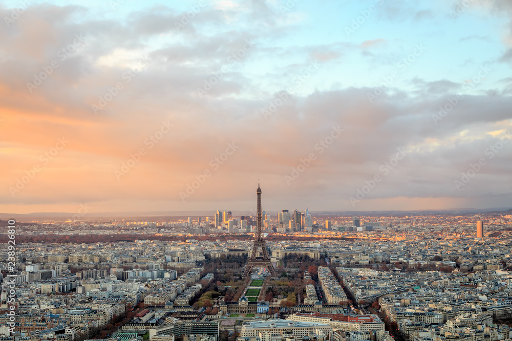 aerial view of the city of paris and the eiffel tower at sunset in france