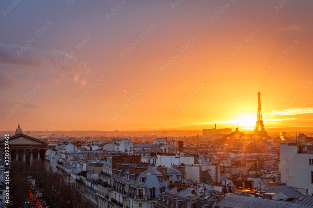 aerial view from the heights on paris and the eiffel tower at sunset aerial view from the heights on paris and the eiffel tower at sunset