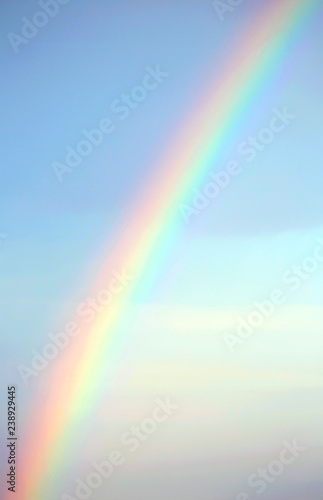 real rainbow after the storm and the blue sky