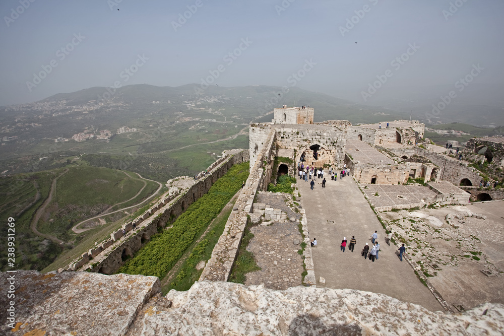 Krak des Chevaliers, Castle of the Hospitallers knights before the war, Syria - obrazy, fototapety, plakaty 