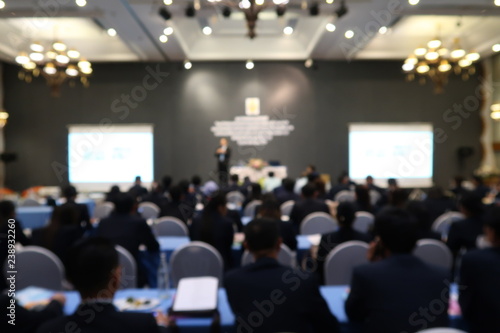people attend conference in the meeting room , blurred background photo