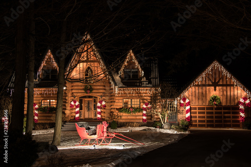 christmas lights on log home