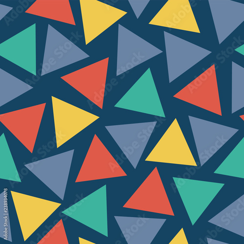 Seamless vector pattern Triangles randomly placed teal, blue, red, yellow on dark blue background. Abstract geometric scattered shapes repeating tile. For fabric, digital paper, kids decor, wallpaper.