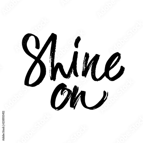 Shine. Black word on white background. Inspirational design for print on tee, card, banner, poster, hoody. ink hand lettering. Modern brush calligraphy. Vector