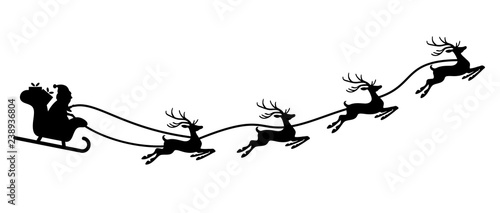 Santa Claus with sled and reindeers