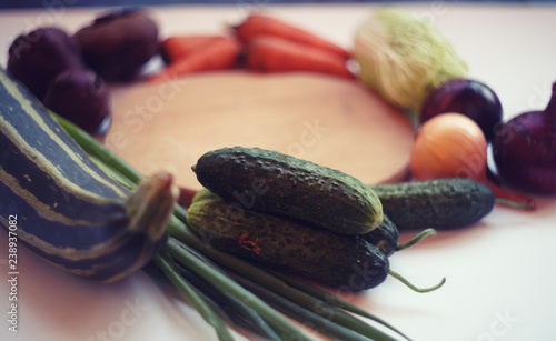 fresh vegetables and cutting board/healthy organic food concept