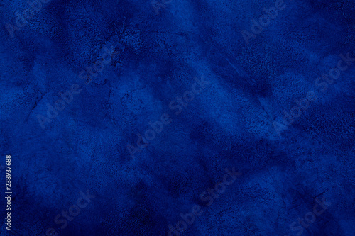 Dark blue marble or cracked concrete background (as an abstract mystical background or marble or concrete texture)