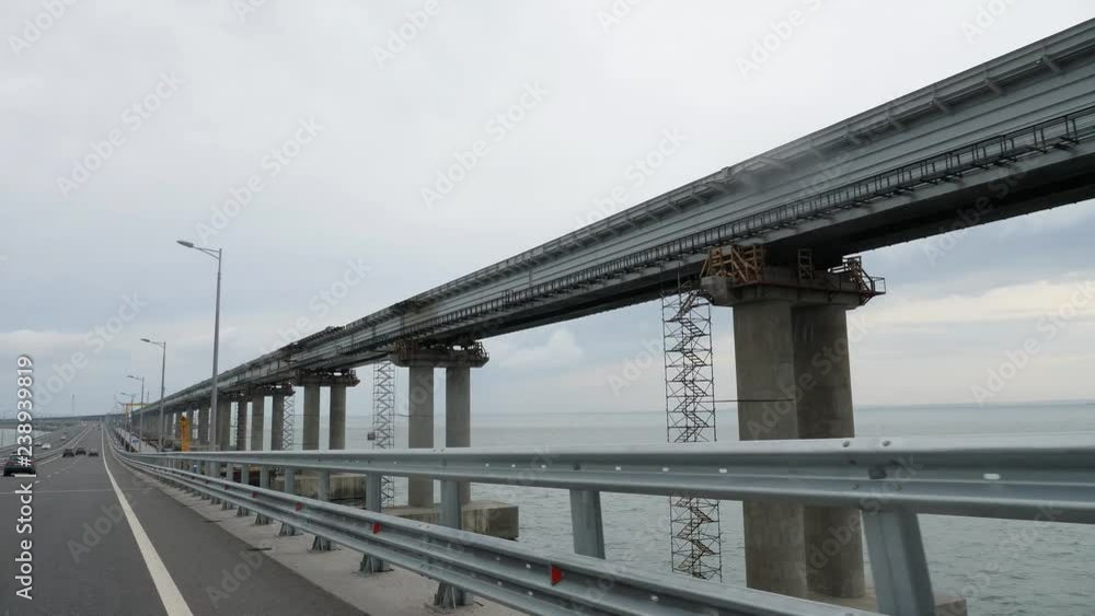 construction of the railway line of the Crimean bridge. Tower cranes at work. Piles drowned in seawater. Installation of bridge spans. Railway track construction. construction of the railway line of the Crimean bridge. Tower cranes at work. Piles drowned in seawater. Installation of bridge spans. Railway track construction.