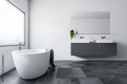 White bathroom  tub and sink  side view