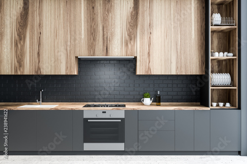 Black brick kitchen, wooden countertops