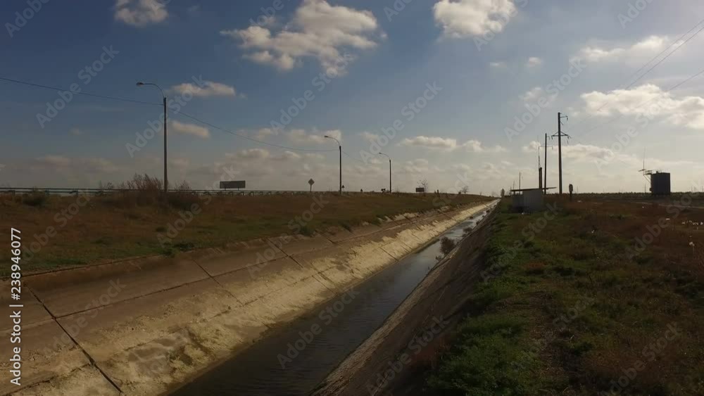 Dry water channel for land reclamation among agricultural fields, for irrigation and water supply Dry water channel for land reclamation among agricultural fields, for irrigation and water supply