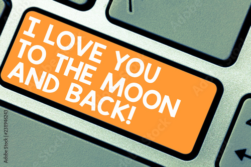 Word writing text I Love You To The Moon And Back. Business concept for Expressing roanalysistic feelings emotions Keyboard key Intention to create computer message pressing keypad idea photo