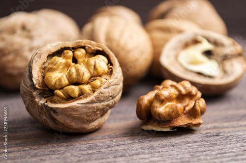 Handful of Walnuts on wooden background