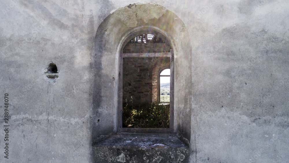 Facade of an old abandoned castle in SztBenedekTransylvania, Romania